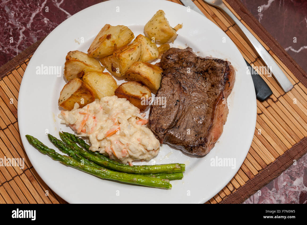 Steak meal with vegetables on a plate from above Stock Photo