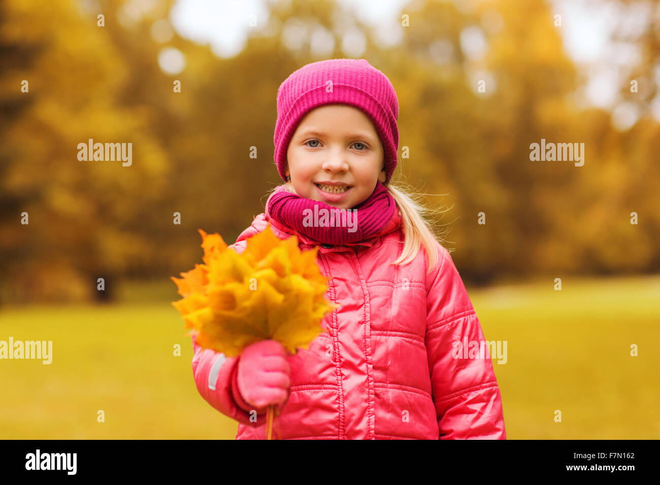 happy beautiful little girl portrait outdoors Stock Photo - Alamy