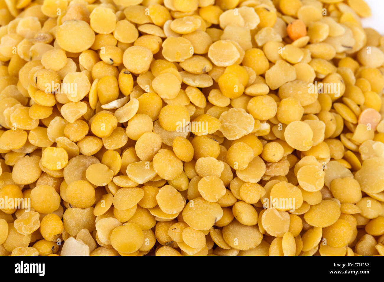 Yellow lentils isolated on white background.Macro shot Stock Photo Alamy
