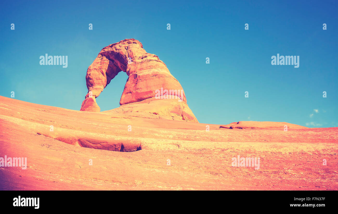 Vintage toned Delicate Arch at sunset, Utah, USA. Stock Photo