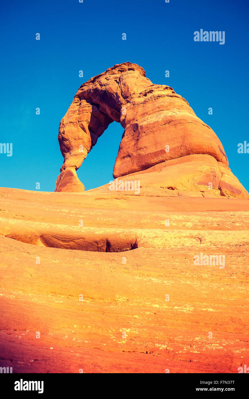 Vintage toned Delicate Arch at sunset, Utah, USA. Stock Photo