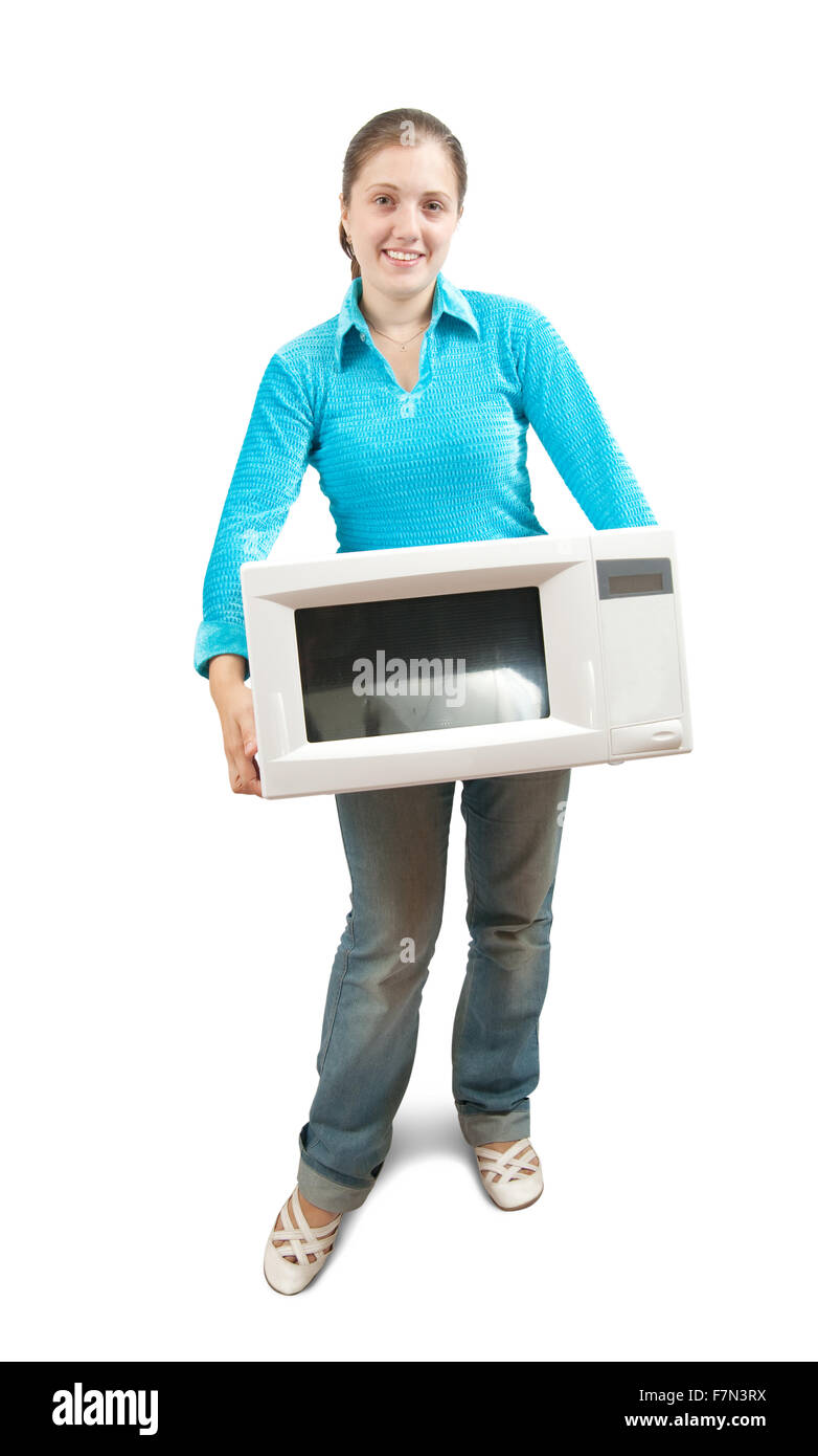 Young woman in blue with mini oven. Isolated over white Stock Photo