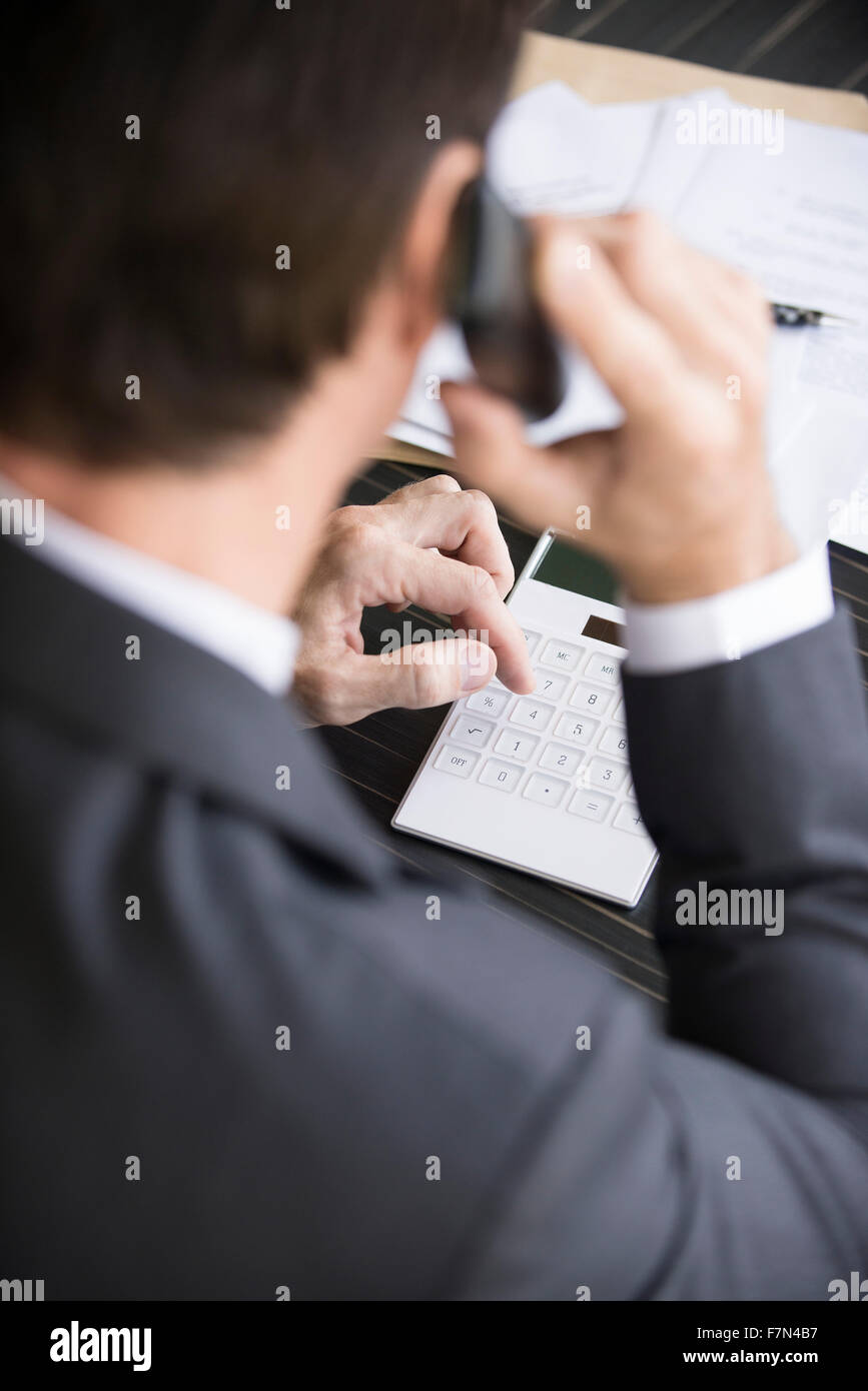 Accountant making phone call Stock Photo