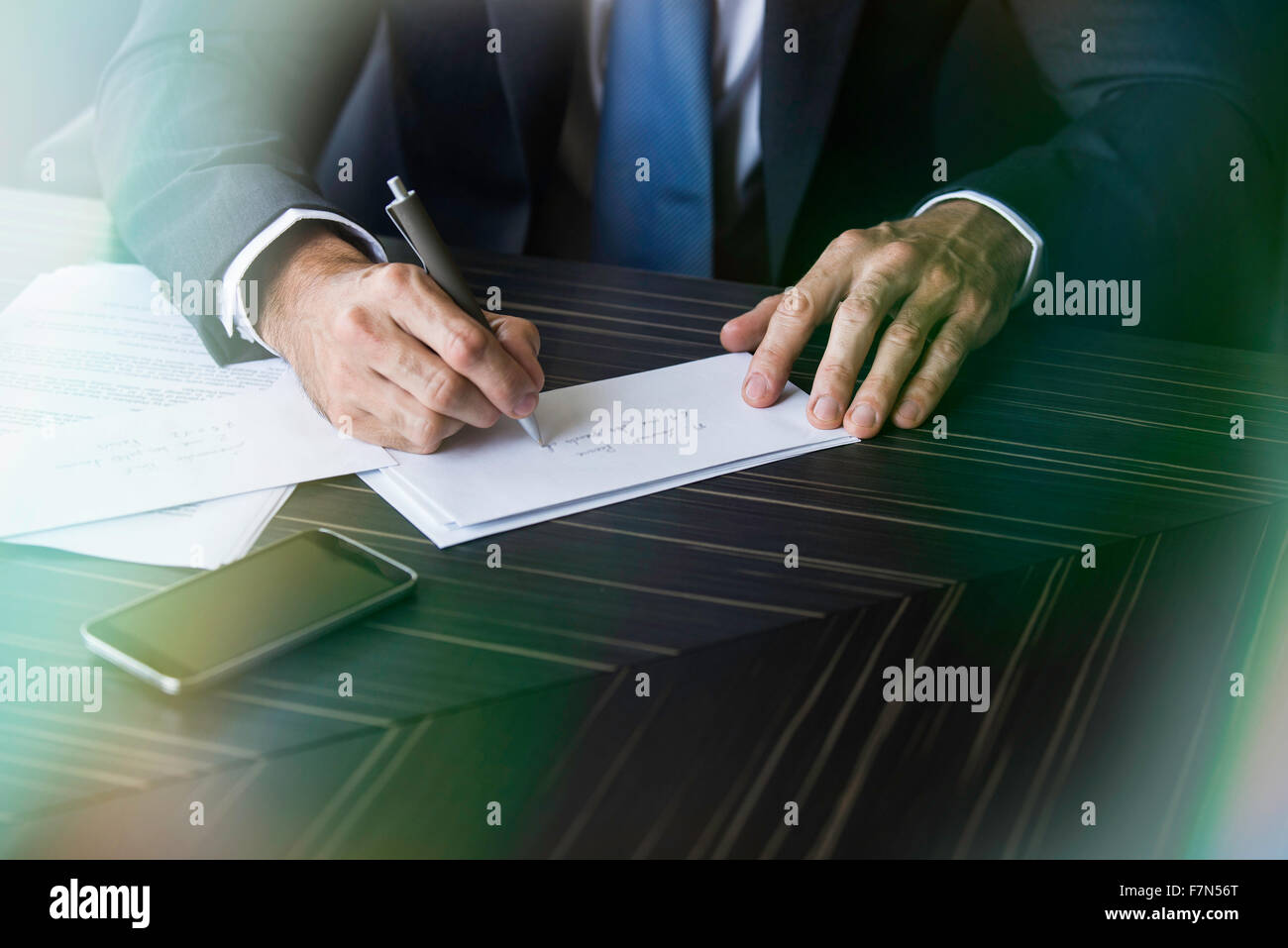 Lawyer addressing envelope Stock Photo Alamy