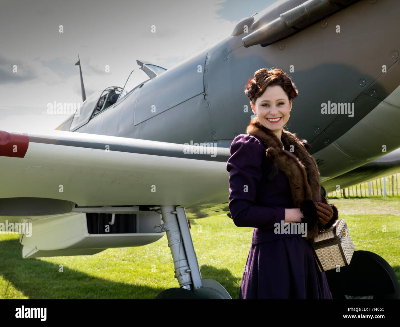 Woman dressed in vintage 1940's fashion at the Goodwood Revival  meeting 2015 Stock Photo