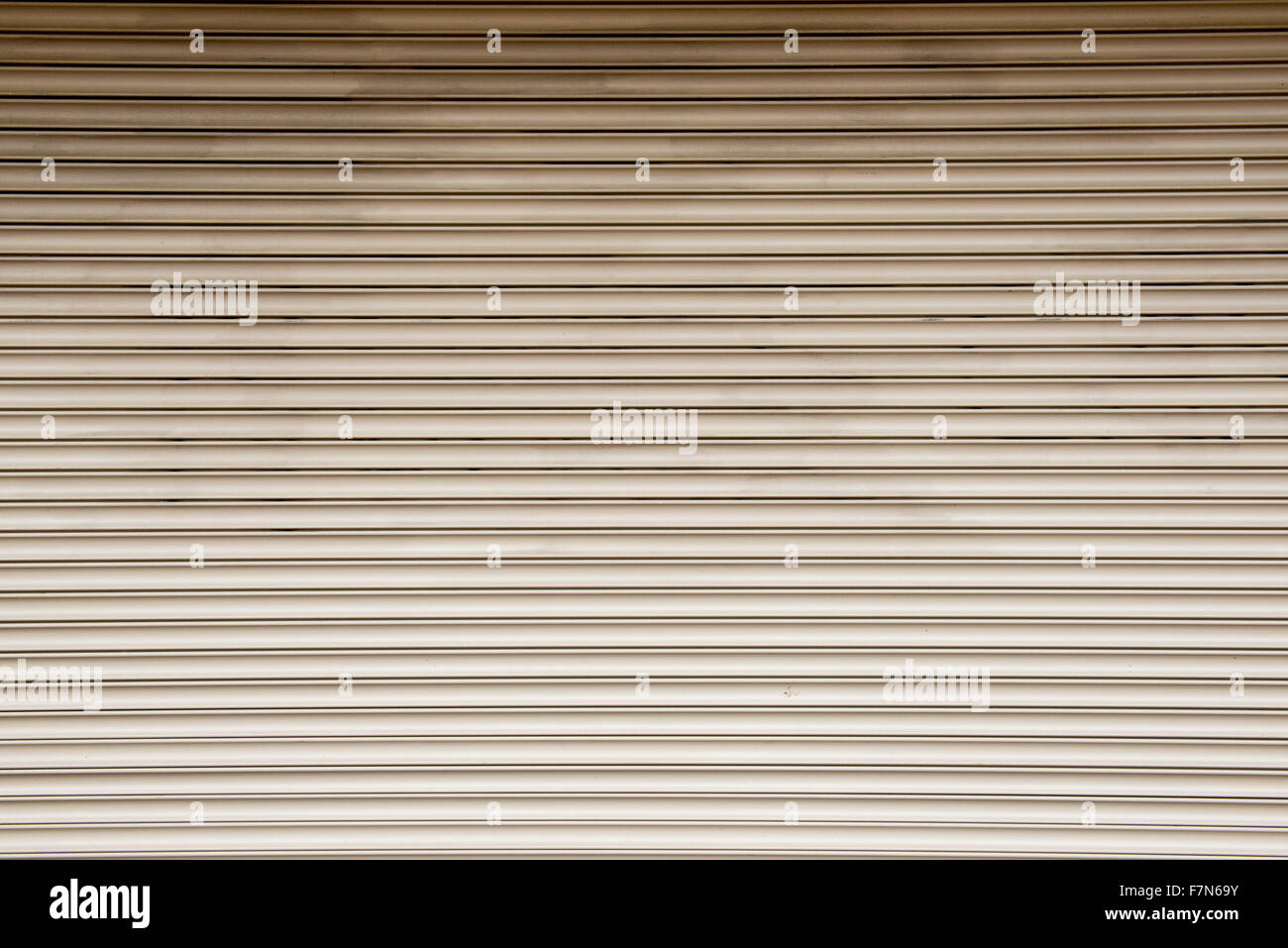 Straight lines on a shop front shutter Stock Photo