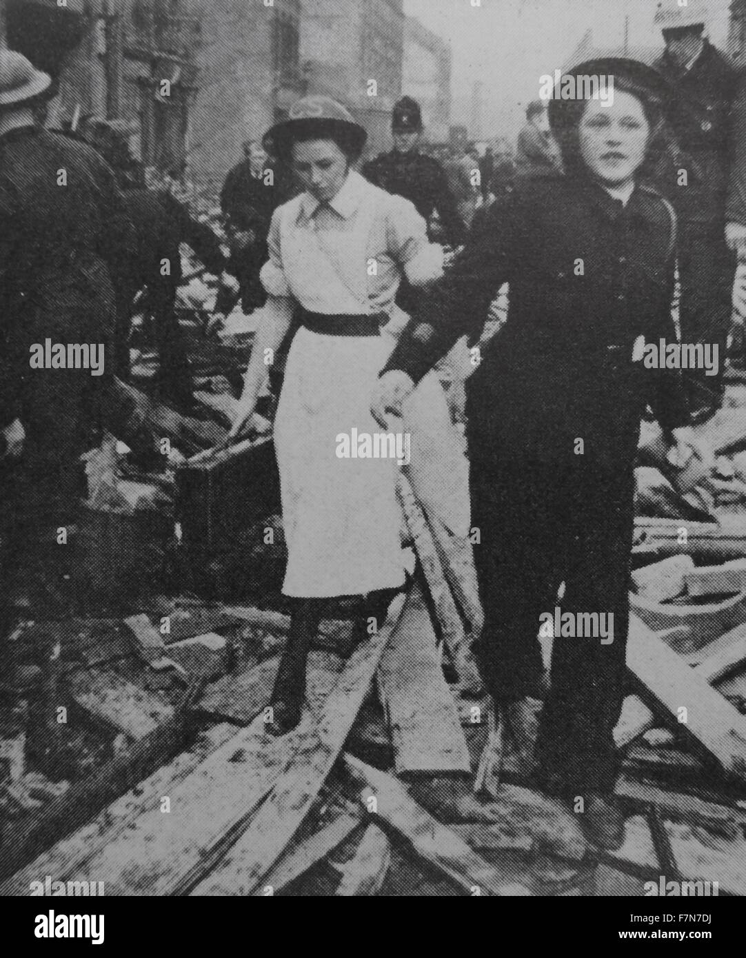 World war two nurse and air raid warden in london after a bombing raid during the blitz 1942 Stock Photo