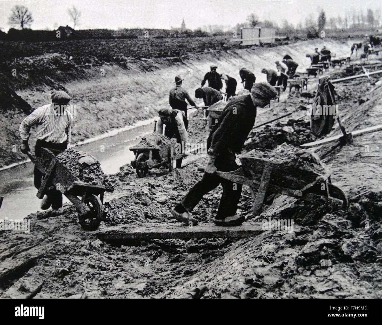 Photograph of the unemployed creating jobs for themselves. Dated 1928 Stock Photo
