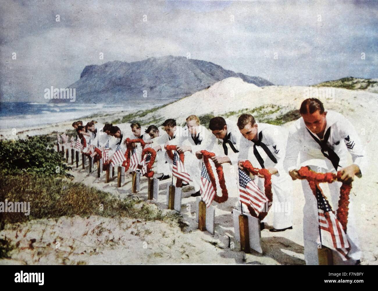 Colour photograph of American Naval officers paying tribute to the 'American Heroes' of the Pearl Harbour. Dated 1941 Stock Photo