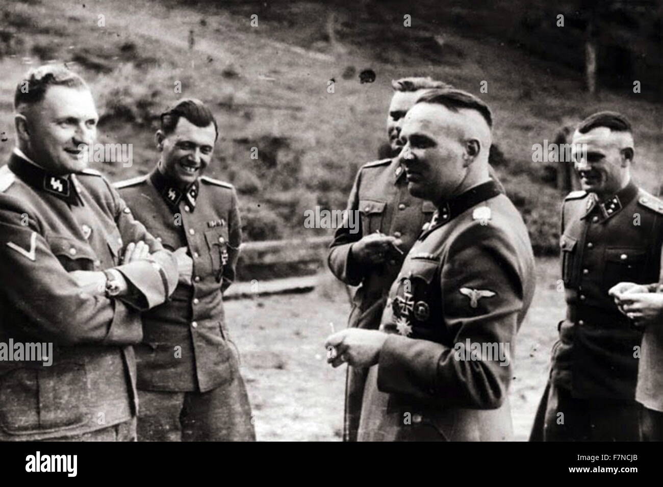 group of SS officers in Auschwitz: From left, Karl Hoecker, Dr. Josef Mengele, Karl-Friedrich Hoecker (11 December 1911 – 30 January 2000) was a SS-Obersturmführer (First Lieutenant) and the adjutant to Richard Baer, who was a commandant of Auschwitz concentration camp from May 1944 to December 1944 Stock Photo