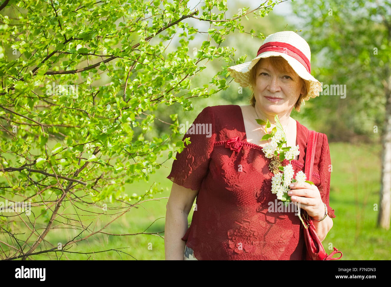 Smiling senior woman spring hi-res stock photography and images - Alamy