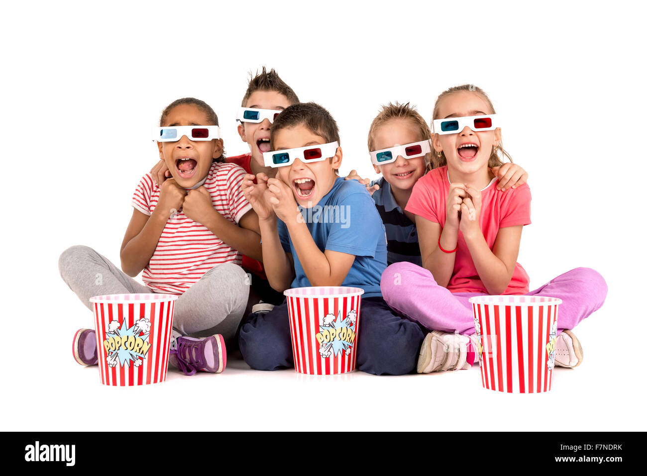 Group of children with 3d glasses and popcorn Stock Photo