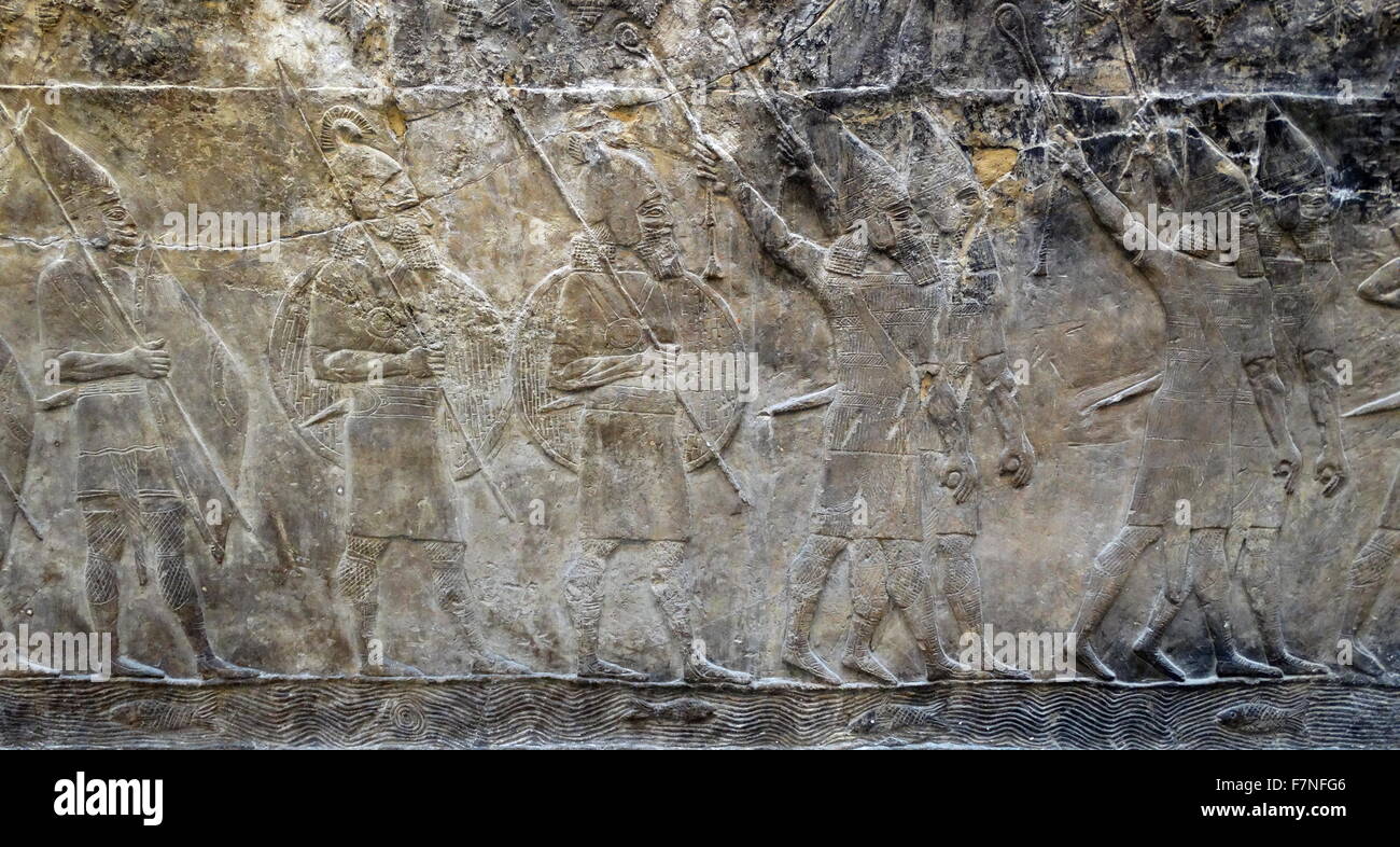 Wall frieze depicting Campaign against the town of -alammu. Assyrian, about 700-692 BC From Nineveh, South-West Palace, Room XIV, panels 4-6. Iraq. Stock Photo
