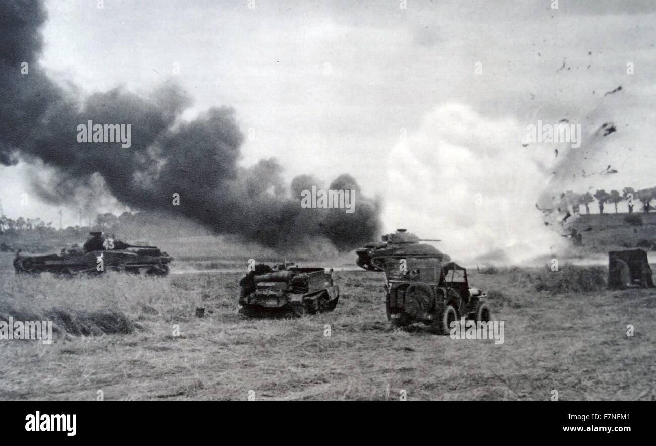 a column of American tanks and motorised vehicles hit by German a anti-aircraft fire. Stock Photo