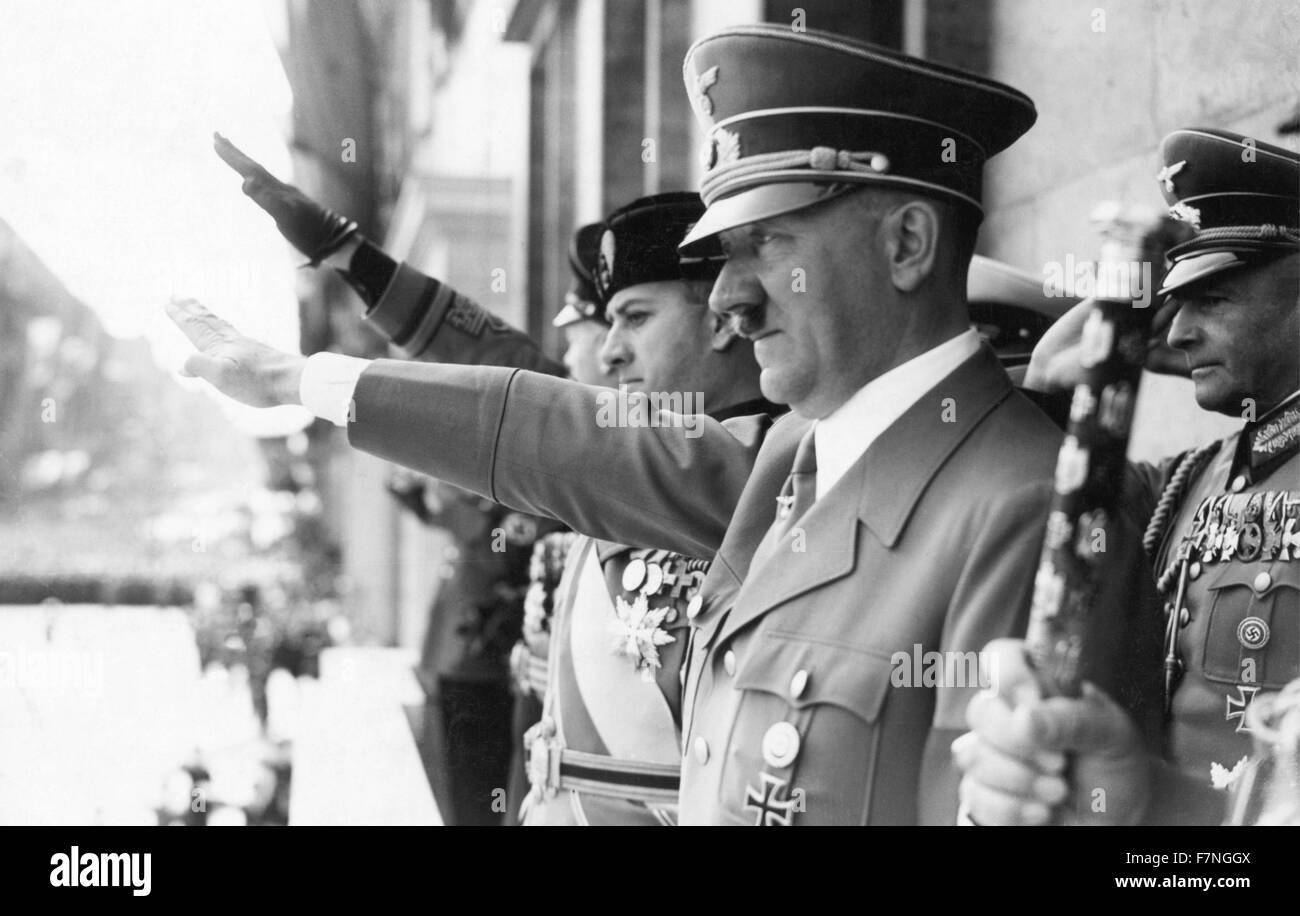 Photograph of Adolf Hitler and Count Ciano saluting on the chancellery balcony, Berlin. Dated 1943 Stock Photo