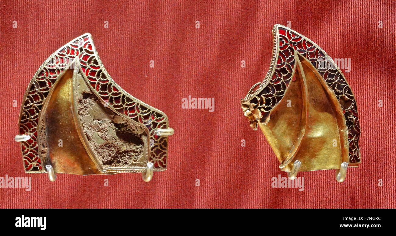 Anglo Saxon metalwork; 5th-6th Century AD. Pair of mounts, decorated with cloisonné Stock Photo