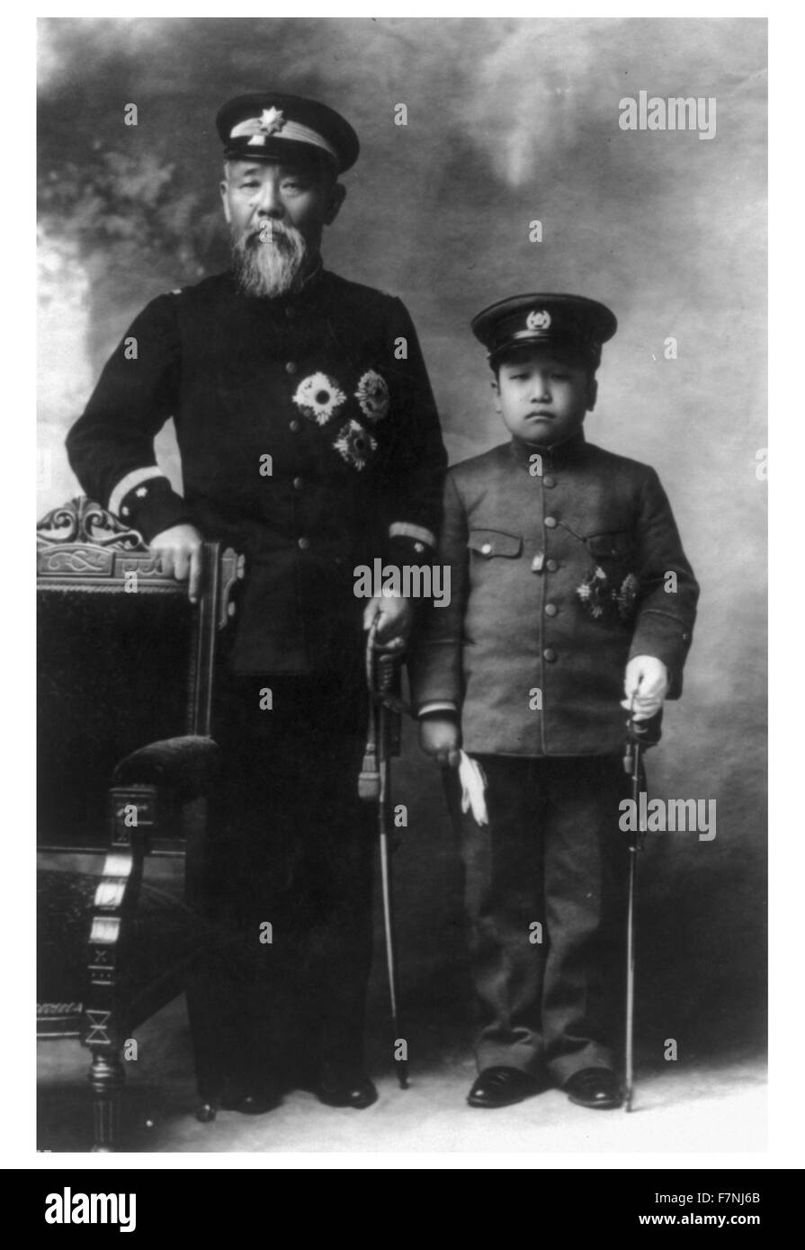 Photograph of Prince Ito Hirobumi of Japan (1841-1909) samurai of Ch?sh? Domain, Japanese statesman, four time Prime Minister of Japan, genr? and Resident-General of Korea and Crown Prince Yi Un of Korea (1897-1970) 28th Head of the Korean Imperial House, an Imperial Japanese Army general and the last crown prince of Korea. Dated 1907 Stock Photo