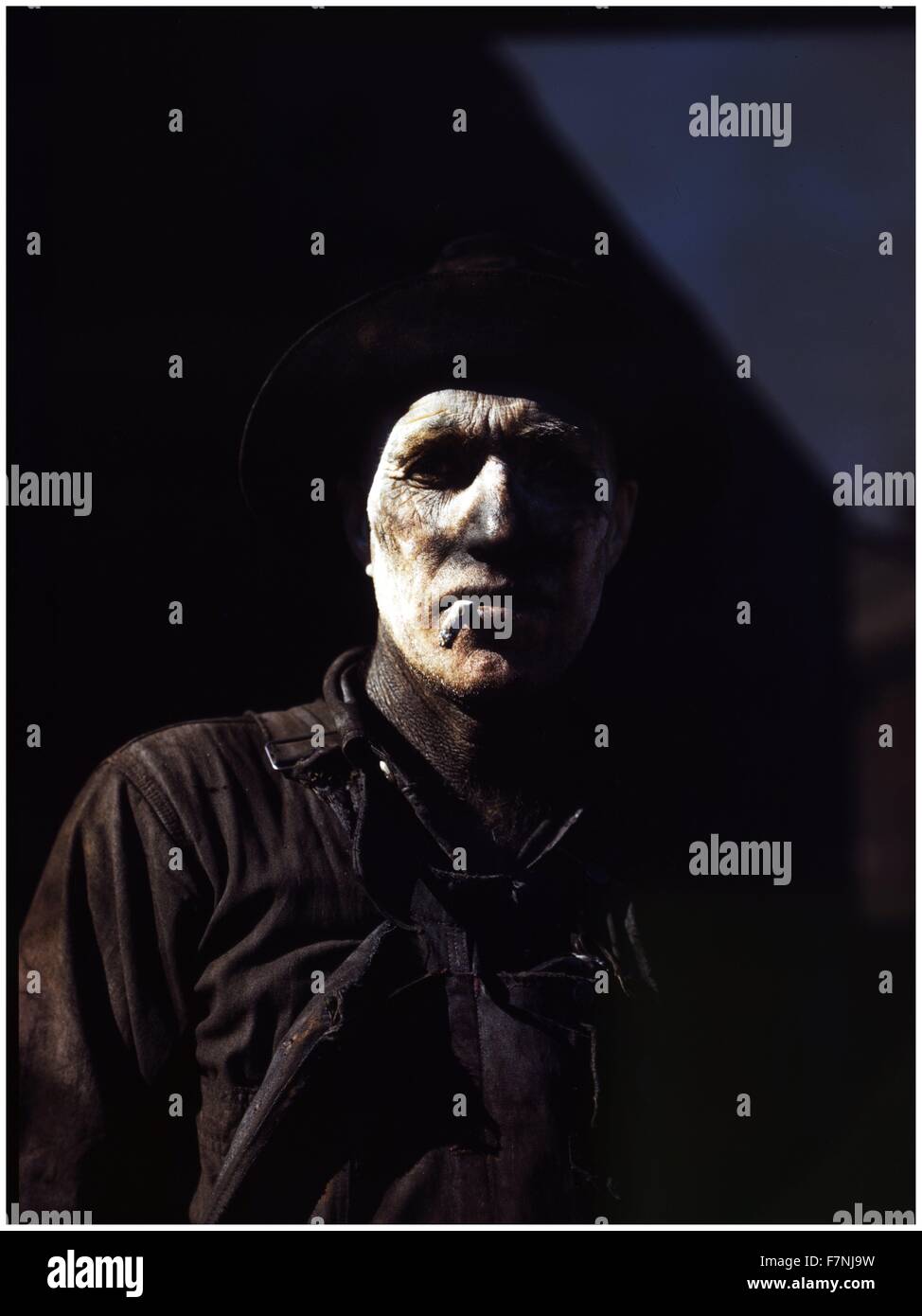 Worker at carbon black plant, Sunray, Texas.  1942 Photograph by John Vachon, 1914-1975, photographer Stock Photo