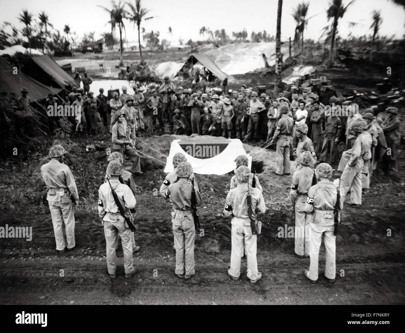World War two: The funeral of Japanese general Yoshitsugu Sait?, Saipan, 1944. Yoshitsugu Sait? (1890 – 10 July 1944) lieutenant general in the Imperial Japanese Army during World War II. In April 1944, Sait? was appointed commander of the IJA 43rd Division at the time of its deployment to Saipan. Sait?, wounded by shrapnel, committed ritual suicide in a cave at dawn on 10 July, with his adjutant shooting him in the head after he had disembowelled himself. Stock Photo