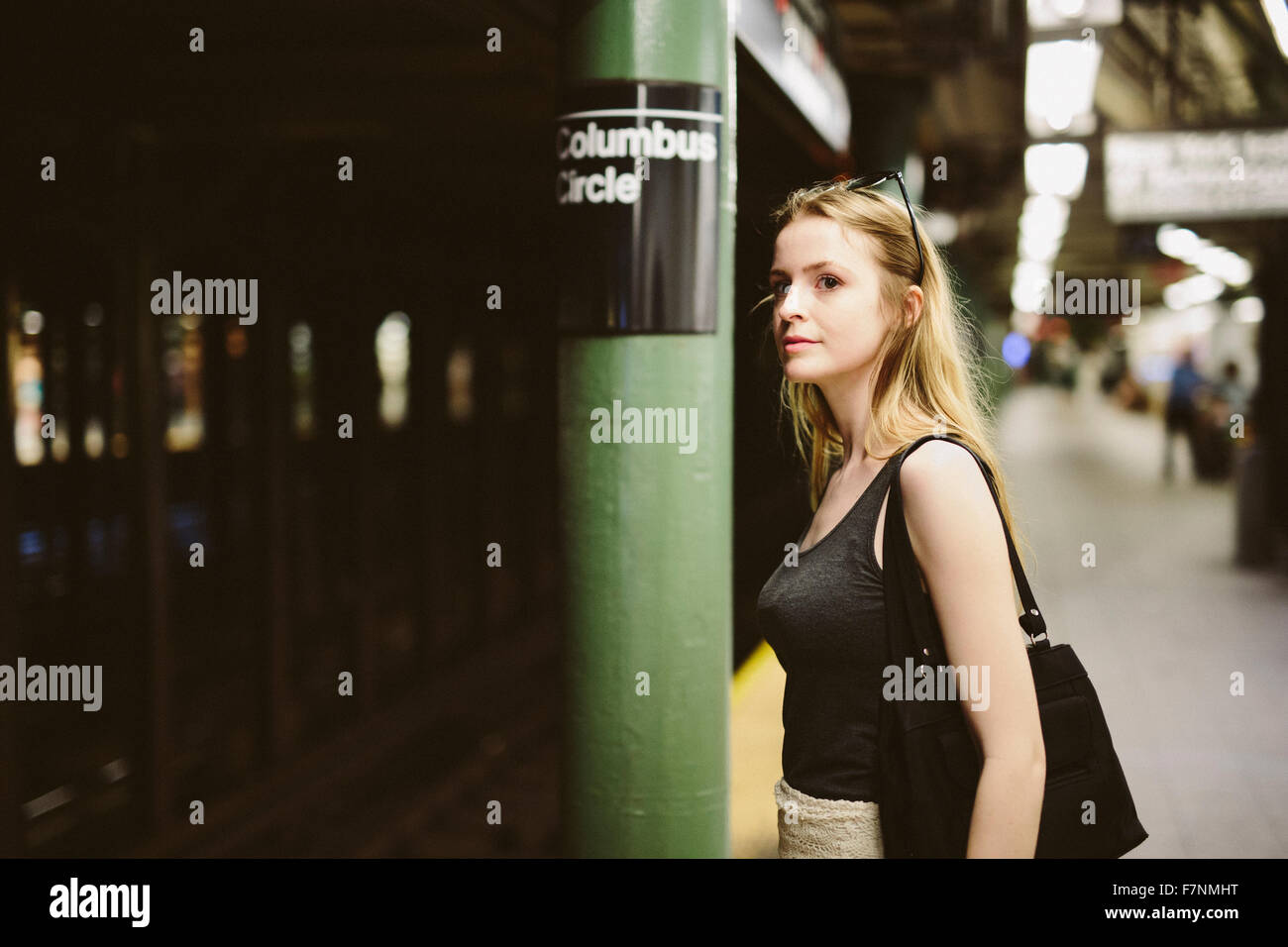 USA, New York City, young woman in the subway in Manhattan Stock Photo