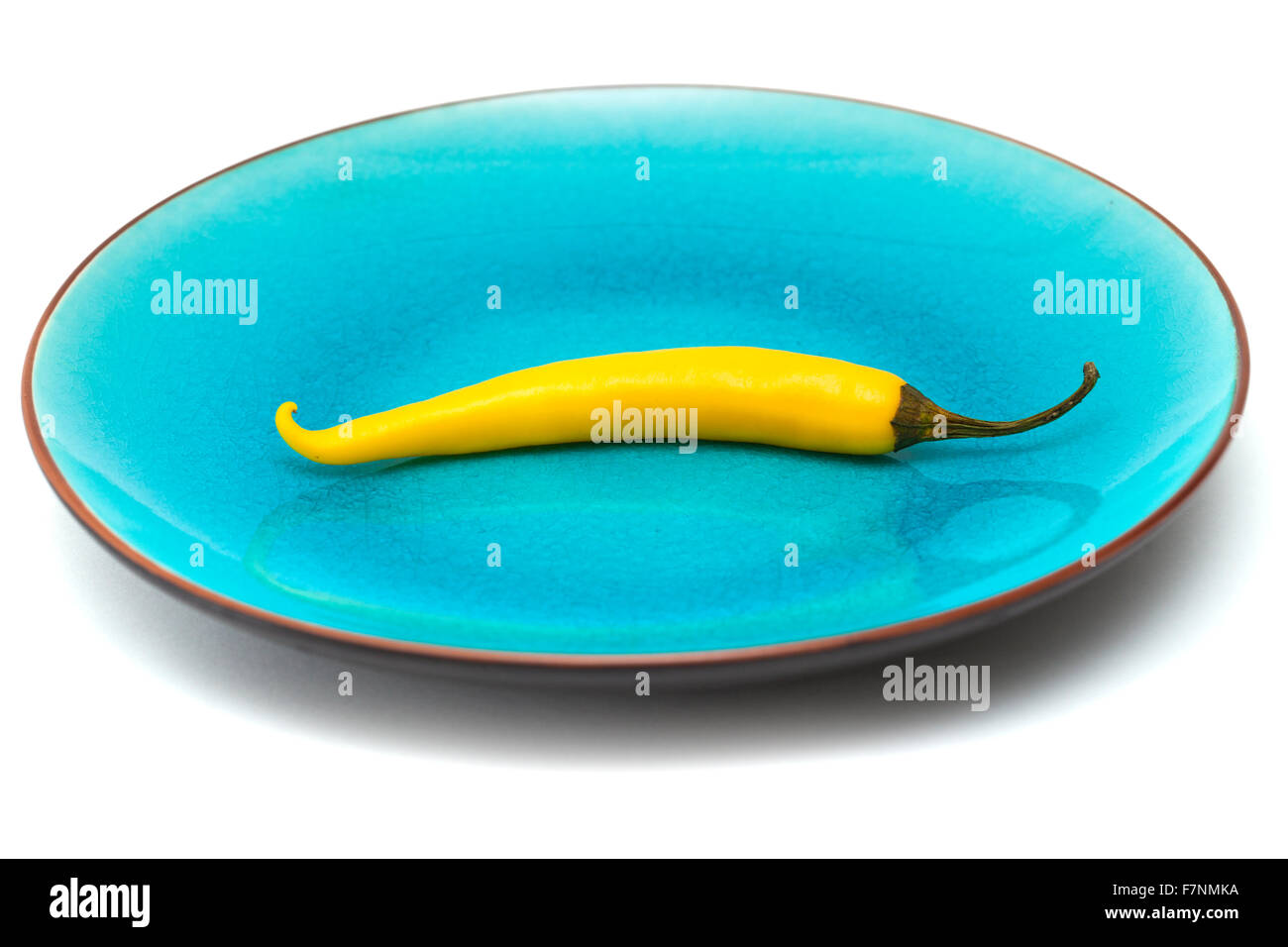 yellow chili pepper isolated on white background Stock Photo - Alamy