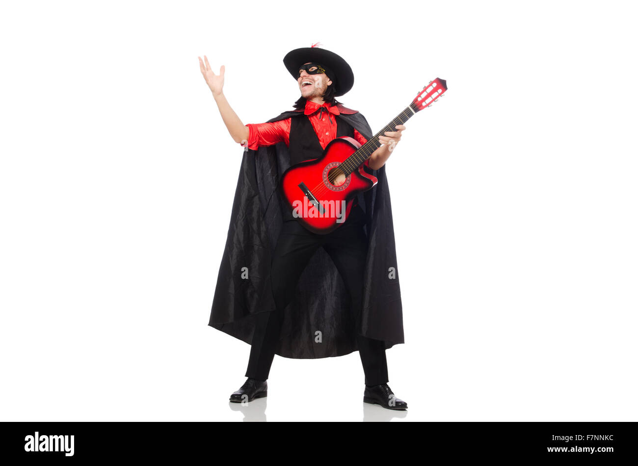 Young man in carnival coat  with guitar isolated on white Stock Photo