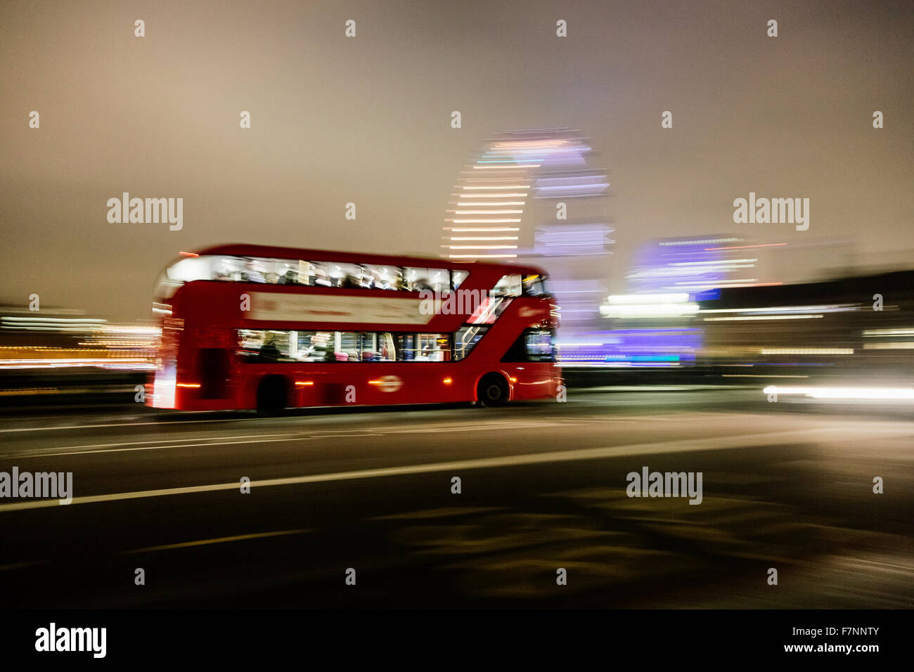 UK, London, driving double-decker bus at night Stock Photo