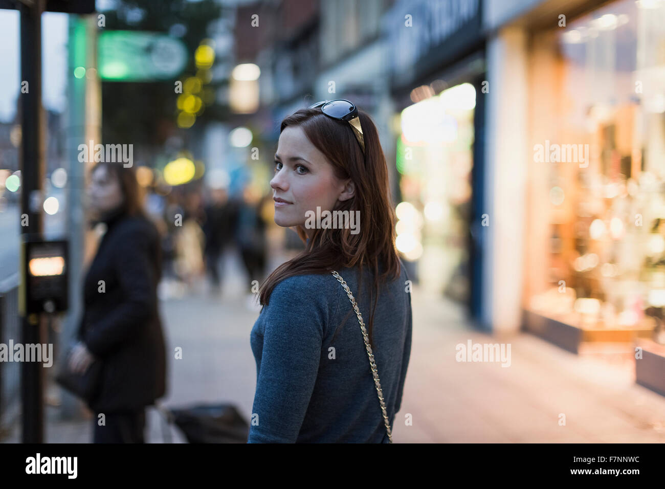 Woman strolling in the city Stock Photo