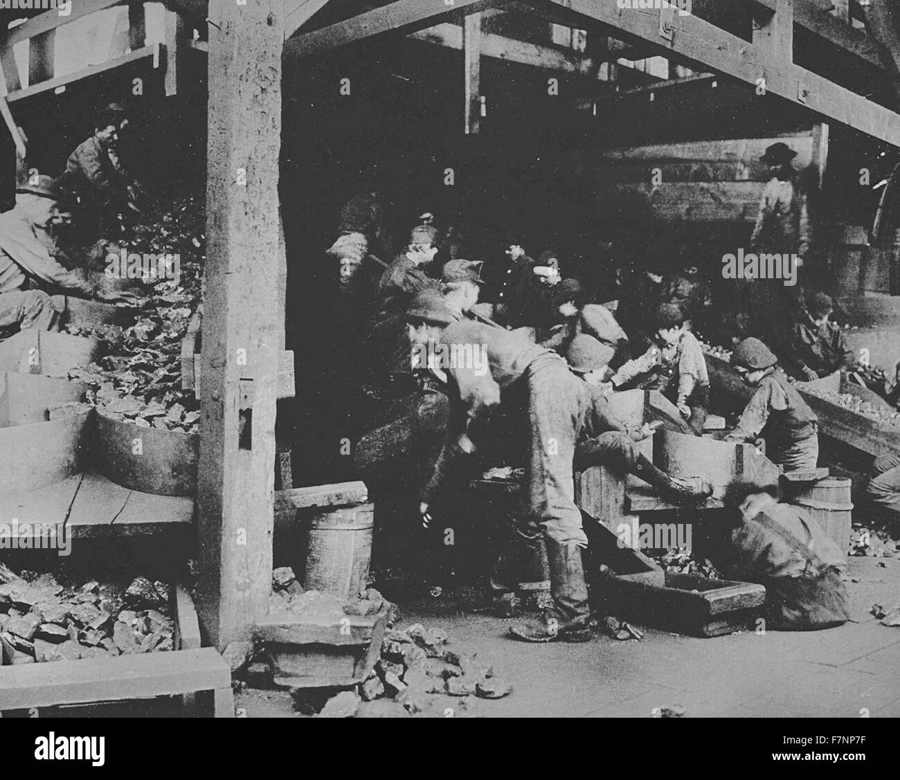 Boys picking slate from coal at a coalmine in the USa 1900 Stock Photo