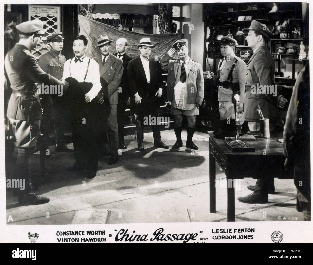 Lobby poster from the film 'China Passage' staring Constance Worth (1913-1963), Vinton Hayworth (1906-1970) and Leslie Fenton (1902-1978). Stock Photo