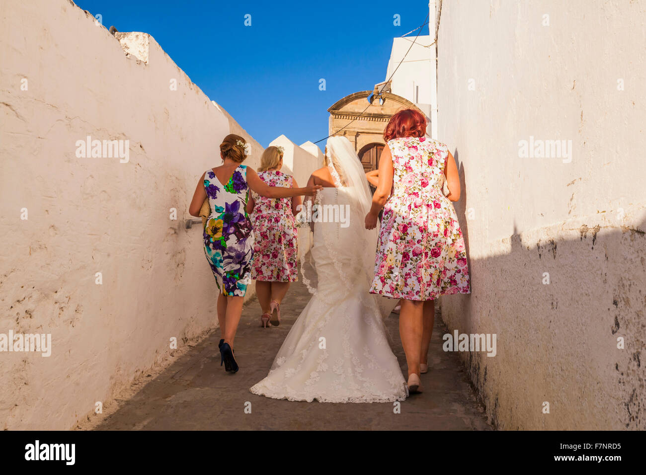 Greece, Rhodes, Lindos, bride with wedding party Stock Photo