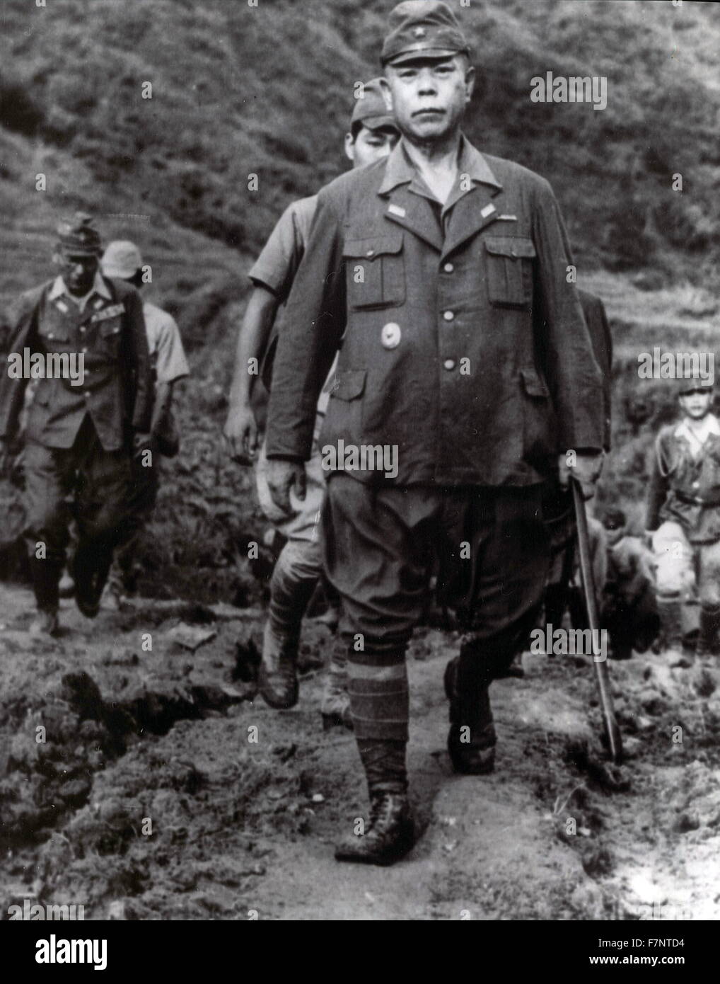Photograph of General Tomoyuki Yamashita surrending (1885-1946). An Imperial Japanese Army general during World War II. He was executed by hanging after being found guilty of war crimes by a trial in Manila. Dated 1946 Stock Photo