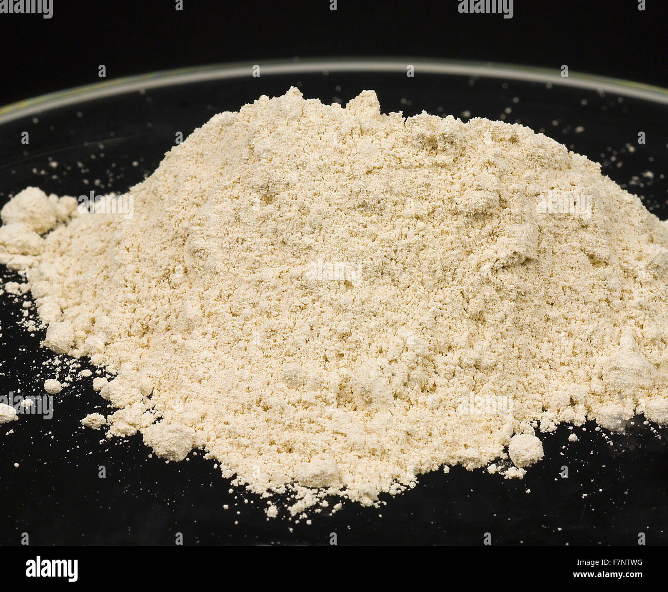 Photograph of powdered heroin. Heroin commonly known by its street names of H, smack, boy, horse, brown, black, tar, and others is an opioid analgesic. Dated 2015 Stock Photo