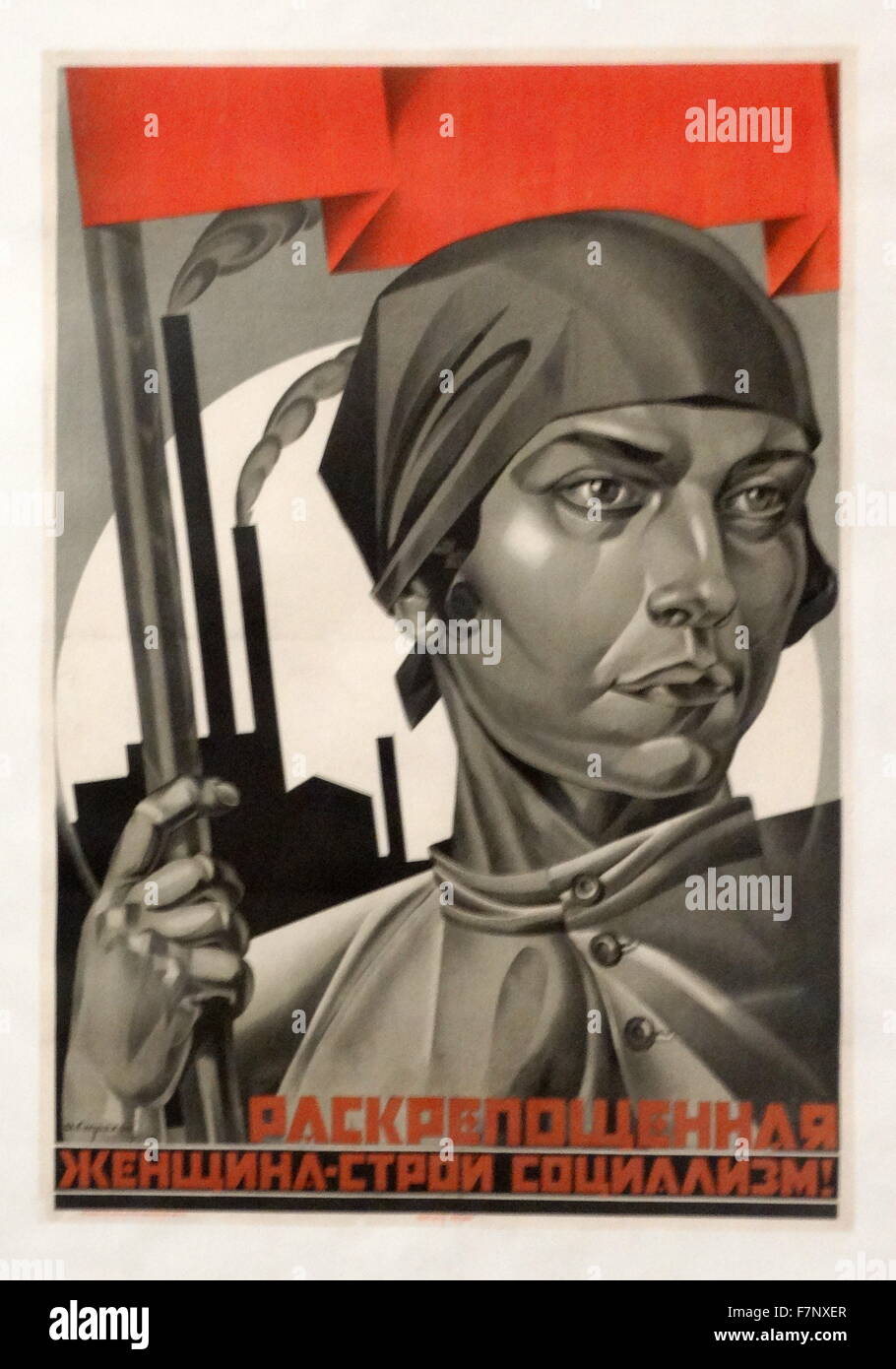 Russian, Soviet, Communist poster, with the slogan: 'You Are Now a Free Woman - Help Build Socialism!' by Adolf Strakhov 1920 Stock Photo