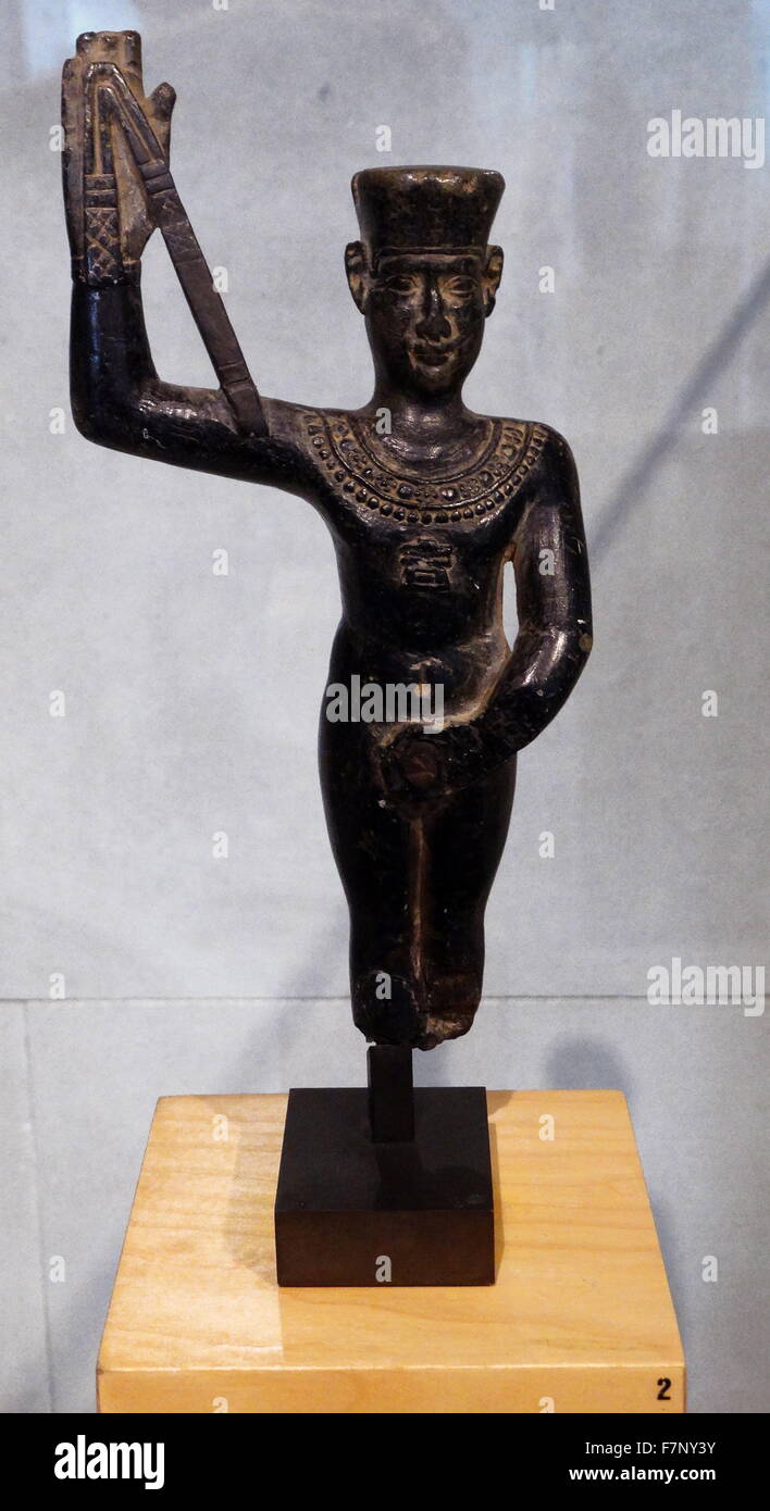 Egyptian statuette of Min-Amun. steatite. Roman Period (1st-2nd centuries AD). Syncretism IS a fundamental procedure in the Egyptian pantheon. Through the merger of different deities, the Egyptians sought to enhance or underscore some facet of the gods’ personalities Stock Photo