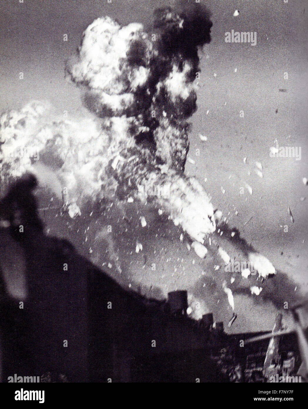 The USS Intrepid is hit by a japanese kamikaze aircraft pilot attack 1944. USS Intrepid, Essex-class aircraft carrier built during World War II for the United States Navy. She is the fourth US Navy ship to bear the name. Commissioned in August 1943 Stock Photo