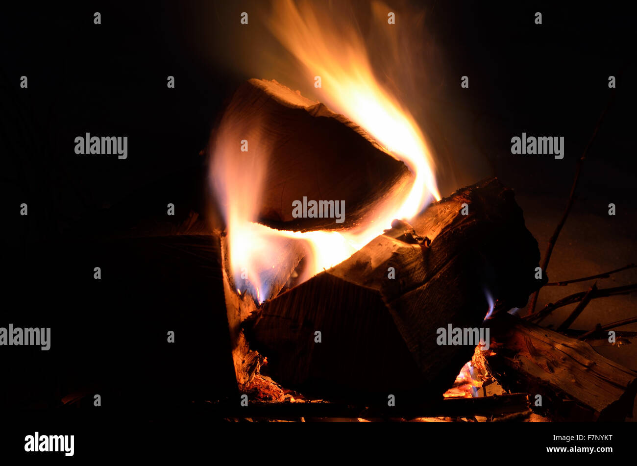 burning birch log fire in winter nature Stock Photo Alamy