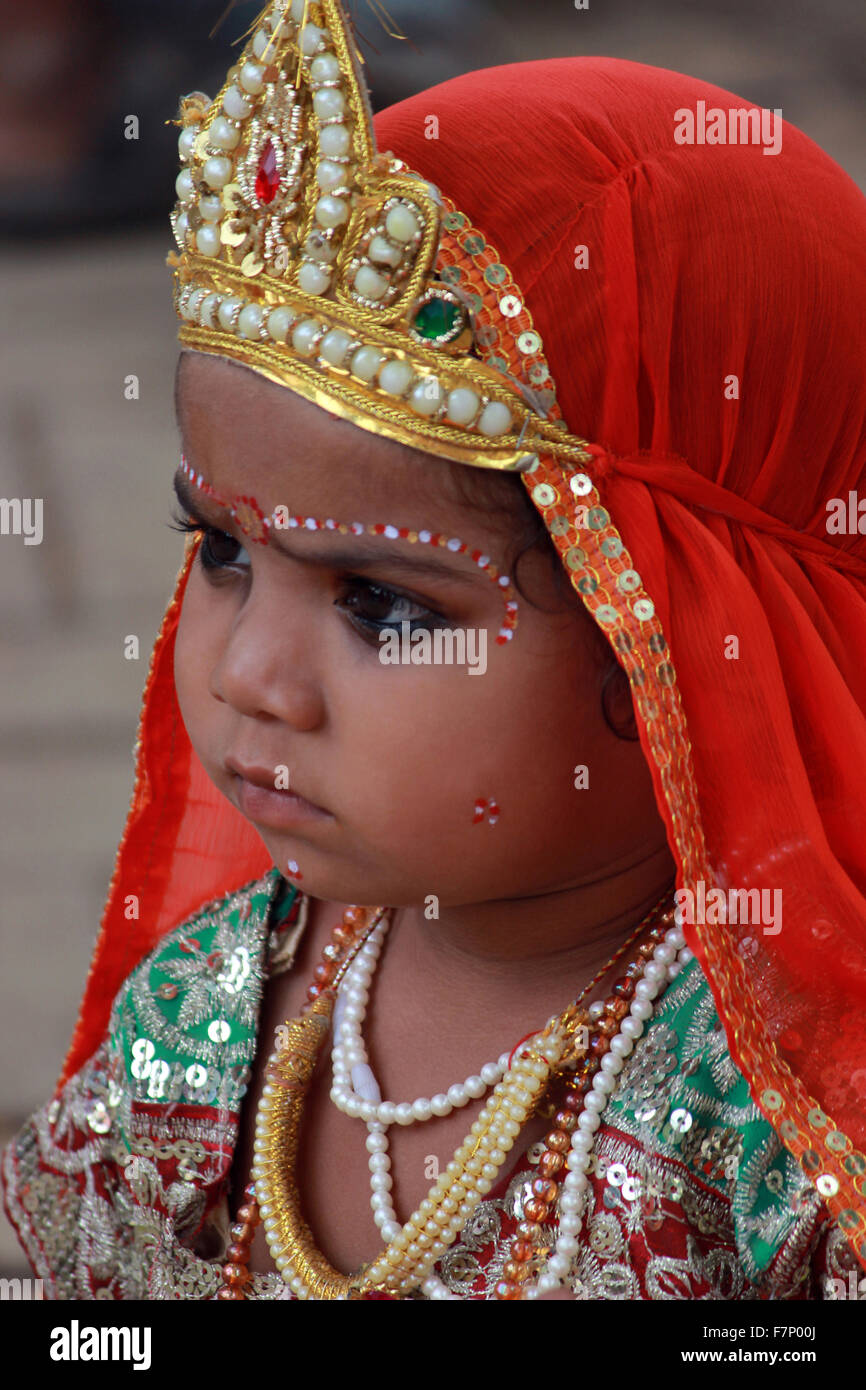 baby girl dressed as radha