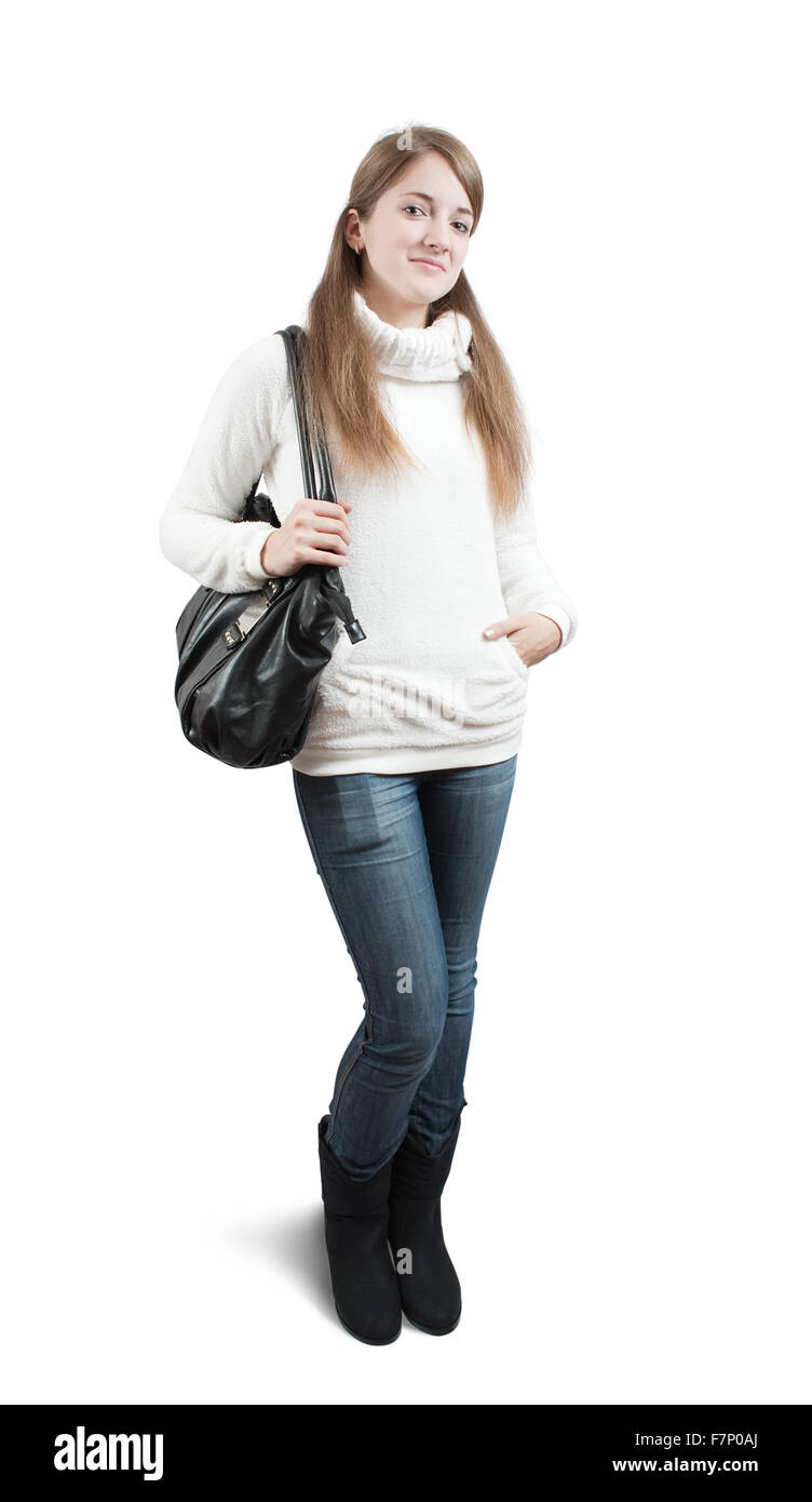 Long-haired teen girl in sweater with handbag Stock Photo