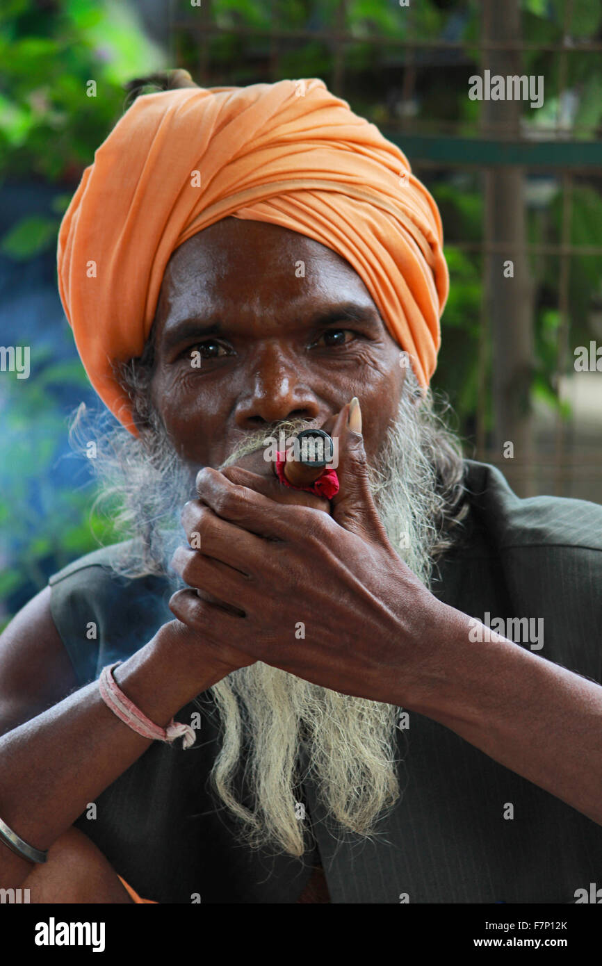 Sadhu smoking chillum Kumbh Mela, Nasik, Maharashtra, India Stock Photo ...