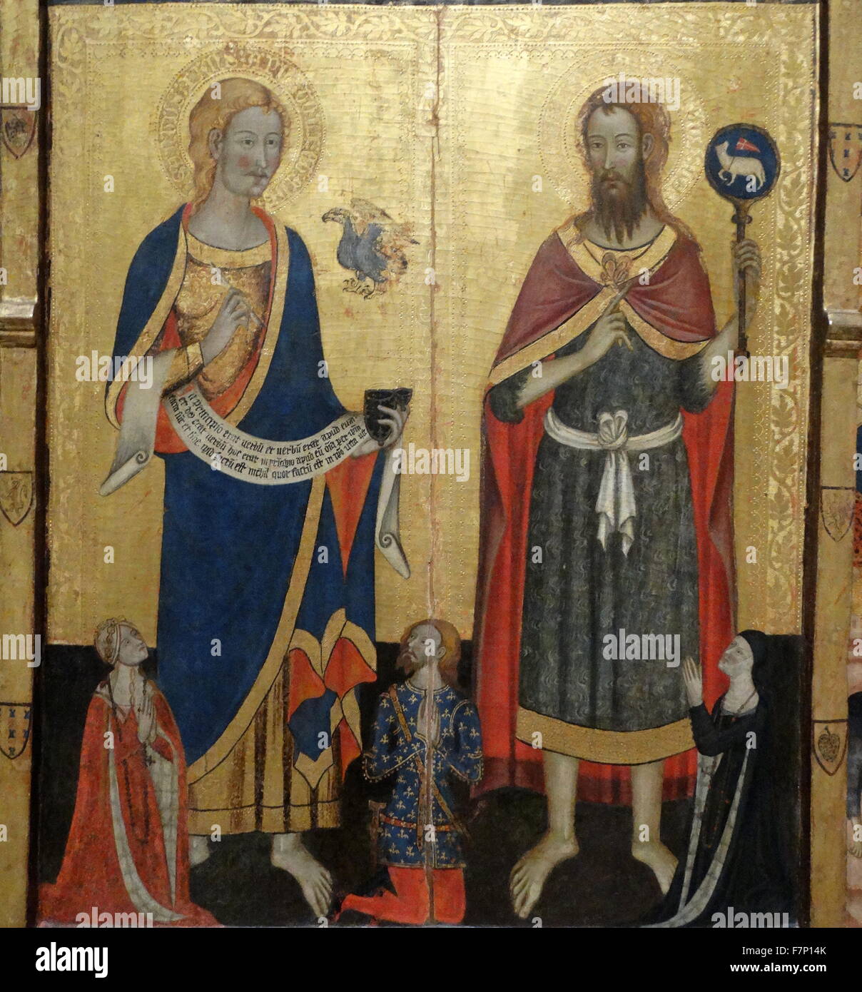 Altarpiece of the Saints John by Master of Santa Coloma de Queralt. Dated 14th Century Stock Photo