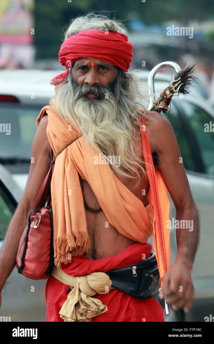 Sadhu in saffron clothes Maharaj Kumbh Mela, Nasik, Maharashtra, India