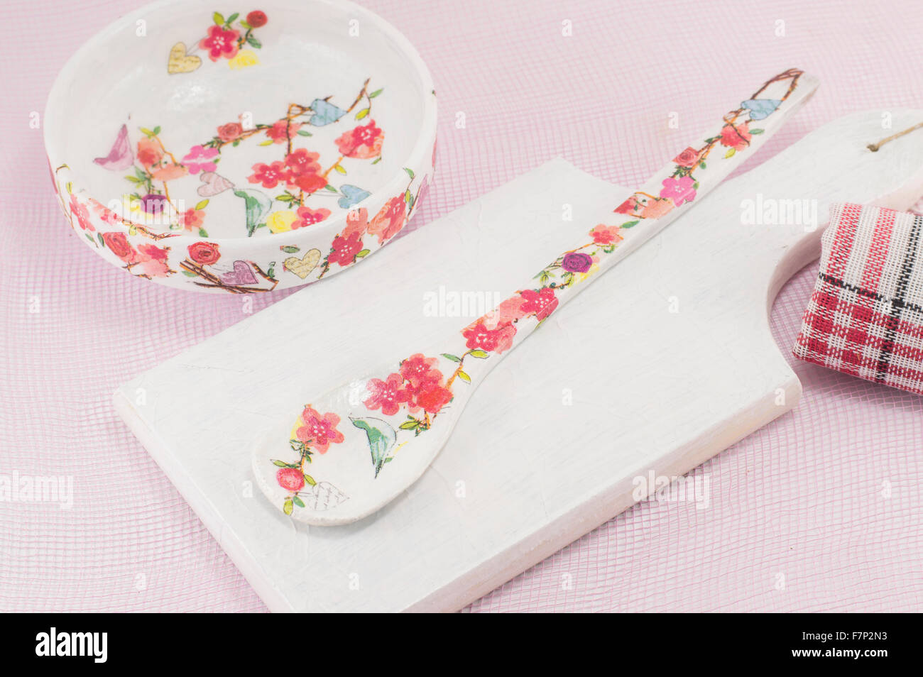 Homemade decoupage decorated kitchen tools with flower pattern Stock