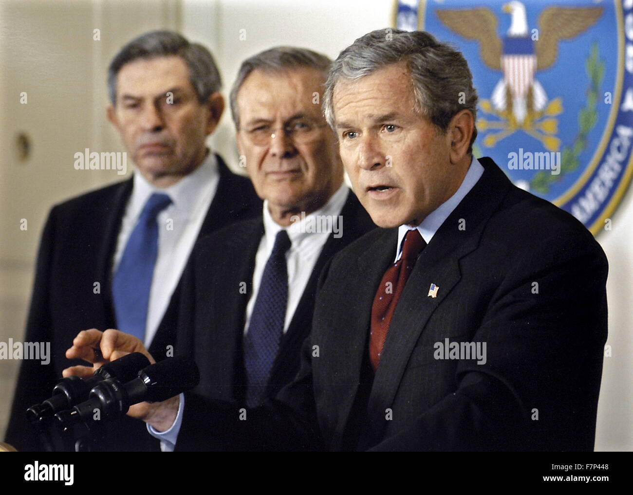 Photograph of President of the World Bank Paul wolfowitz (1943-), American politician and businessman Donald Rumnsfeld (1932-) Former President of the United States George H W Bush (1924-). Dated 2003 Stock Photo