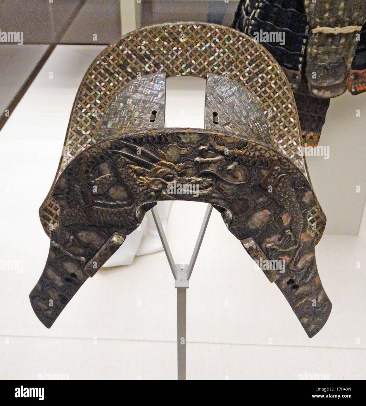 Wood, lacquer and shell inlay saddle with dragons and clouds. Dated 17th Century Stock Photo