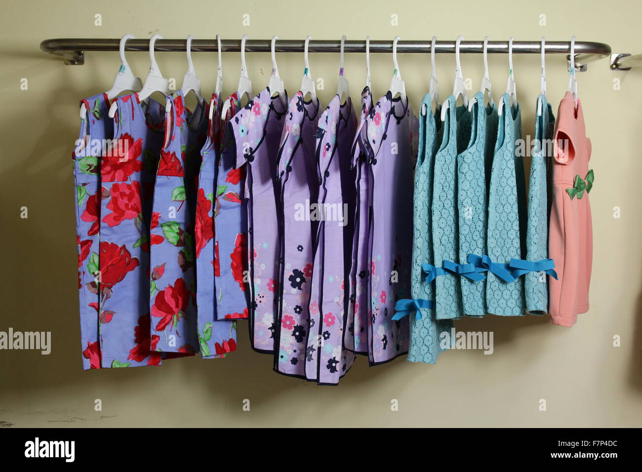 Baby Girl Clothing Hanging on clothesline Stock Photo Alamy