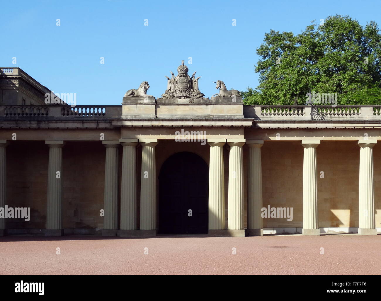 Royal Crest with lion and Unicorn adorn a courtyard inside Buckingham Palace, London, England Stock Photo