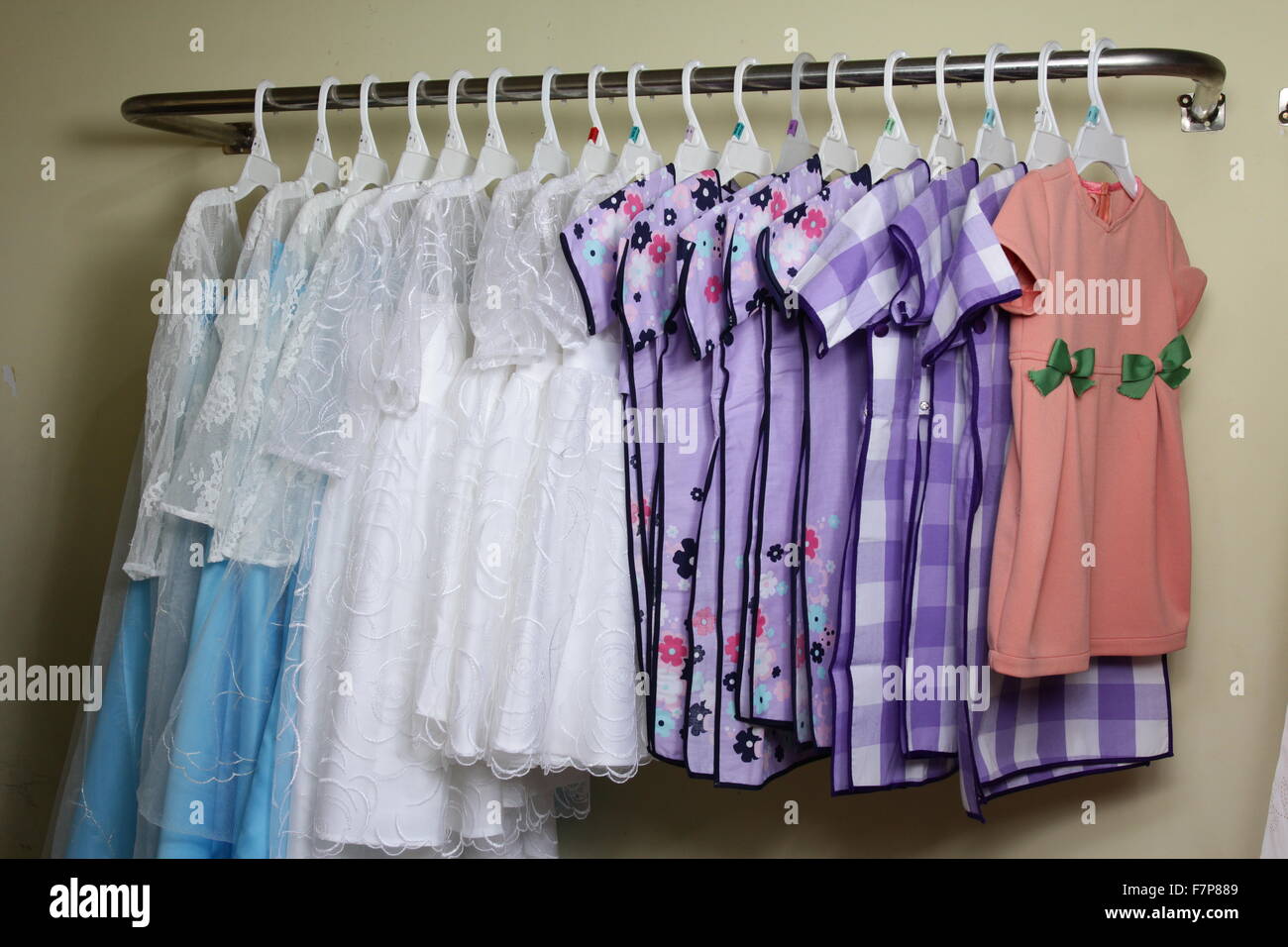 Baby Girl Clothing Hanging on clothesline Stock Photo Alamy