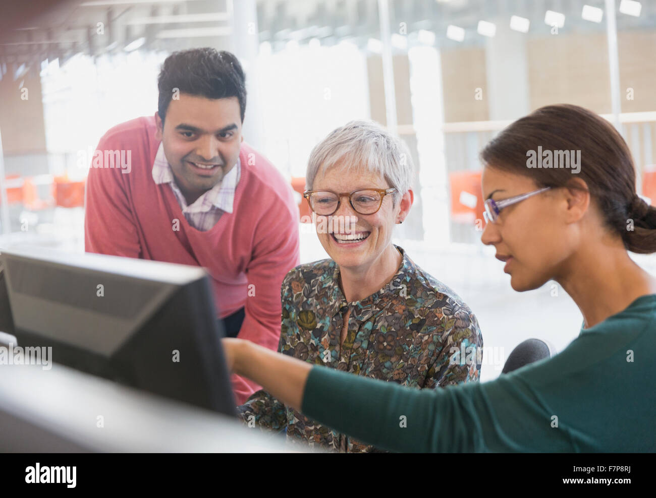 Business people working at computer in office Stock Photo