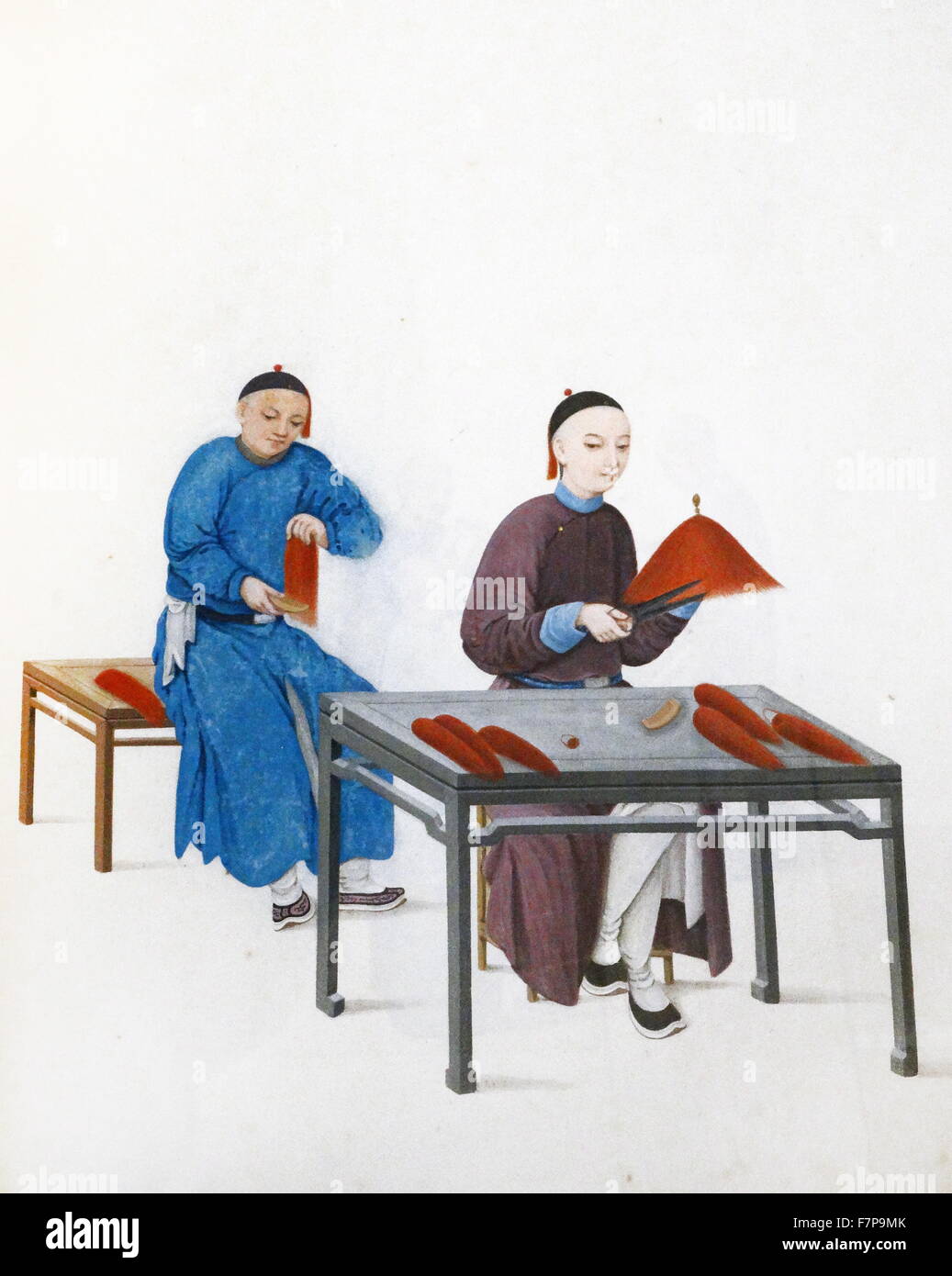 Colour illustration depicting Chinese men making tassels for hats. Throughout the Qing dynasty (1644-1911) men wore caps or hats with red silk tassels. Dated 1850 Stock Photo
